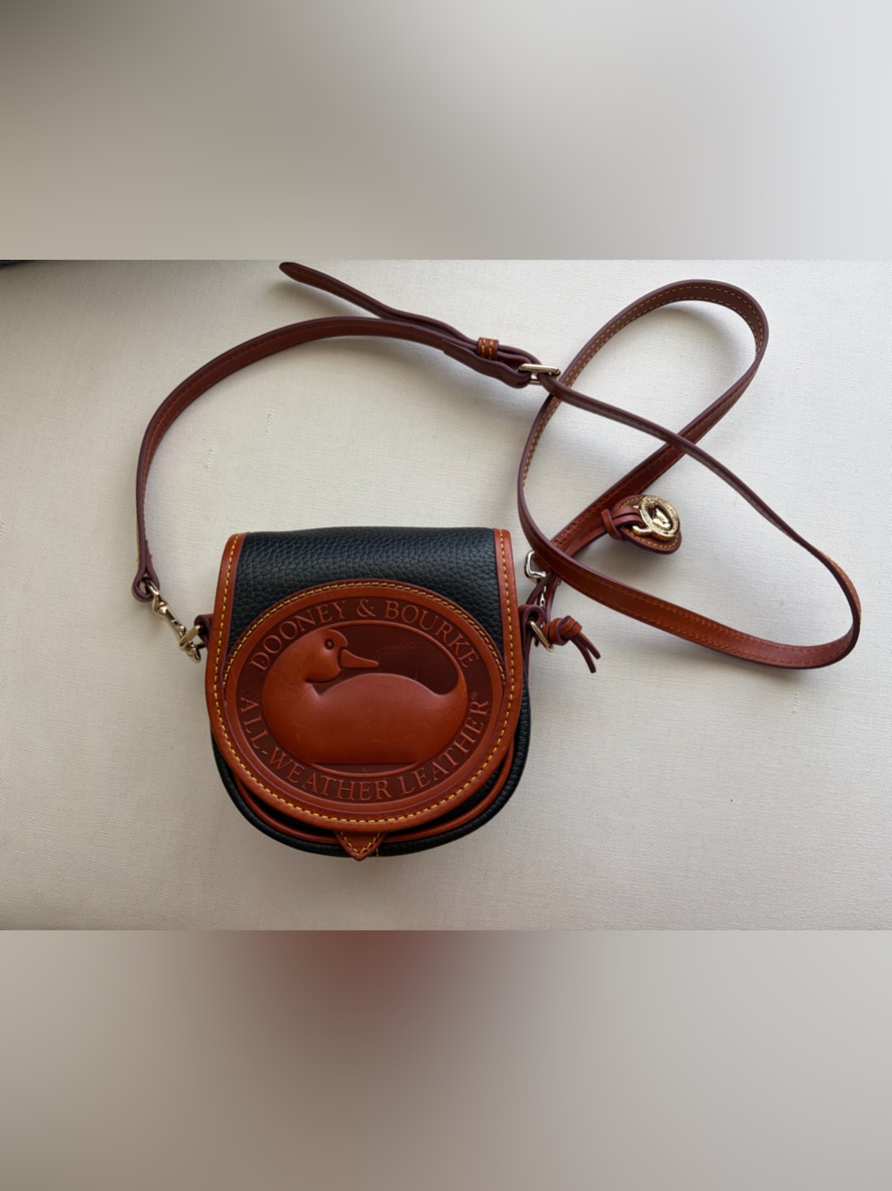 Dooney & Bourke Vintage AWL 2 All Weather Leather Duck Crossbody Bag Black/Tan.